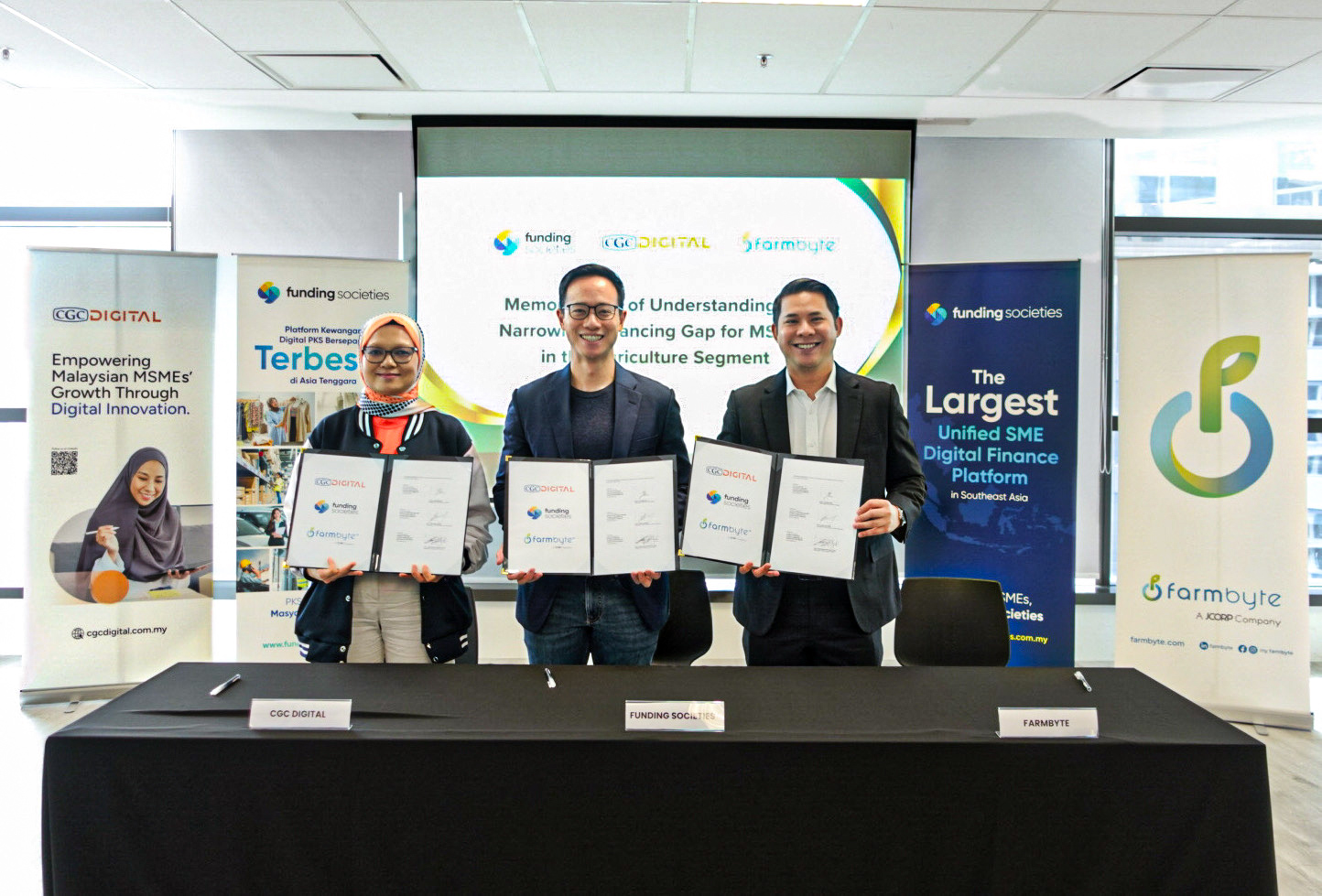 From left to right: Yushida Husin, CEO of CGC Digital., Wong Kah Meng, Group COO & CEO of Funding Societies Malaysia, and Syed Aiman Kifli Syed Jaafar, CEO of FarmByte